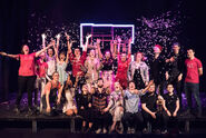 Lucy with the crew of Six, including Toby Marlow, and the queens (Megan Gilbert, Ashleigh Weir, Holly Musgrave, Oliver Wickham, Annabel Marlow, and Shimali de Silva).