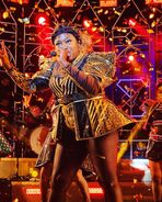 Catherine as portrayed by Candace Furbert in the first Bliss cruise production