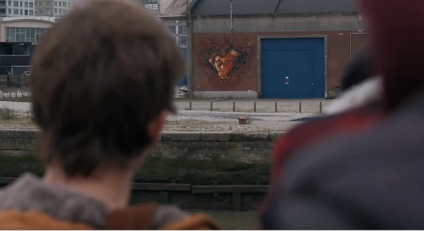 Robbe finds the graffiti picture from Sander.