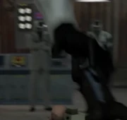 Him standing next to the .