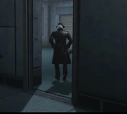 Detective Cameraman leaving the room.