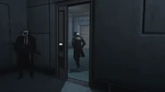 The Detective Cameraman leaving the interrogation room.