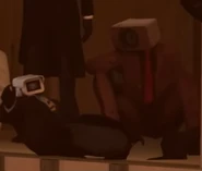 74-CrimsonSpeakerlookingatsimp.jpg (14 KB) The Crimson Speakerman looking at 51MP Cameraman reaching his hand out for TV Woman.