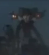 A blurry image of the Weaponized Strider Skibidi Toilet.