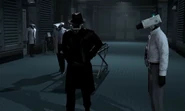 Detective Cameraman walking ahead of the stretcher carrying Plungerman's corpse.