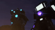 Titan Cameraman and Titan TV Man showing index fingers.
