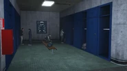 The POV-Cameraman observing the humans in the locker room.