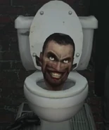 The Normal Skibidi Toilet smiling.