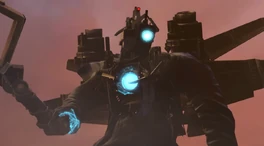 Titan Cameraman attaching one of the  onto his right arm while confidently saying, "For ", indicating he will avenge his fallen companion.