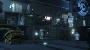 Large TV Man 2.0 inside a storage facility of the Cameramen laboratory.
