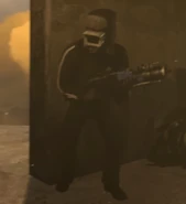 A Russian Cameraman holding a Laser AK-47 Rifle.