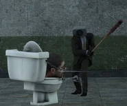 The Baseball Bat Speakerman about to hit a toilet with a bat.