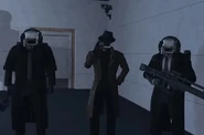 The Detective Cameraman guarded by his two Escorts.