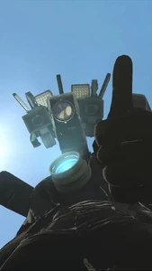 視点カメラマンにサムズアップを向けるタイタンカメラマン。