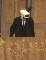 Камерамен с полосатым галстуком