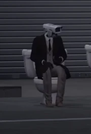 Камерамен в бежевых штанах и ботинках 

  На других языках
  
    [https://skibidi-toilet.fandom