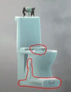 Красным выделены выступающие части побочного унитаза, обратите внимание на переднюю дугу, выпирающую из чаши унитаза