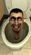 Skibidi Toilet 1.png (362 kB) El cantando frente al Hombre Camara PDV.