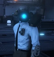 79.1-Hombre Camara Cientifico Senior hacia nosotros.png (491 kB) El Hombre Camara Científico Senior con un traductor colocado en el lateral de su cabeza.