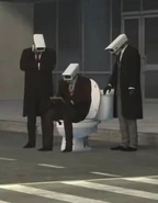 73 flashback - Hombre Camara con Corbata Roja, Abrigo Marron y Traje Gris.jpg (30 kB) El Hombre Camara 51MP sentado en una Skibidi Toilet Normal.