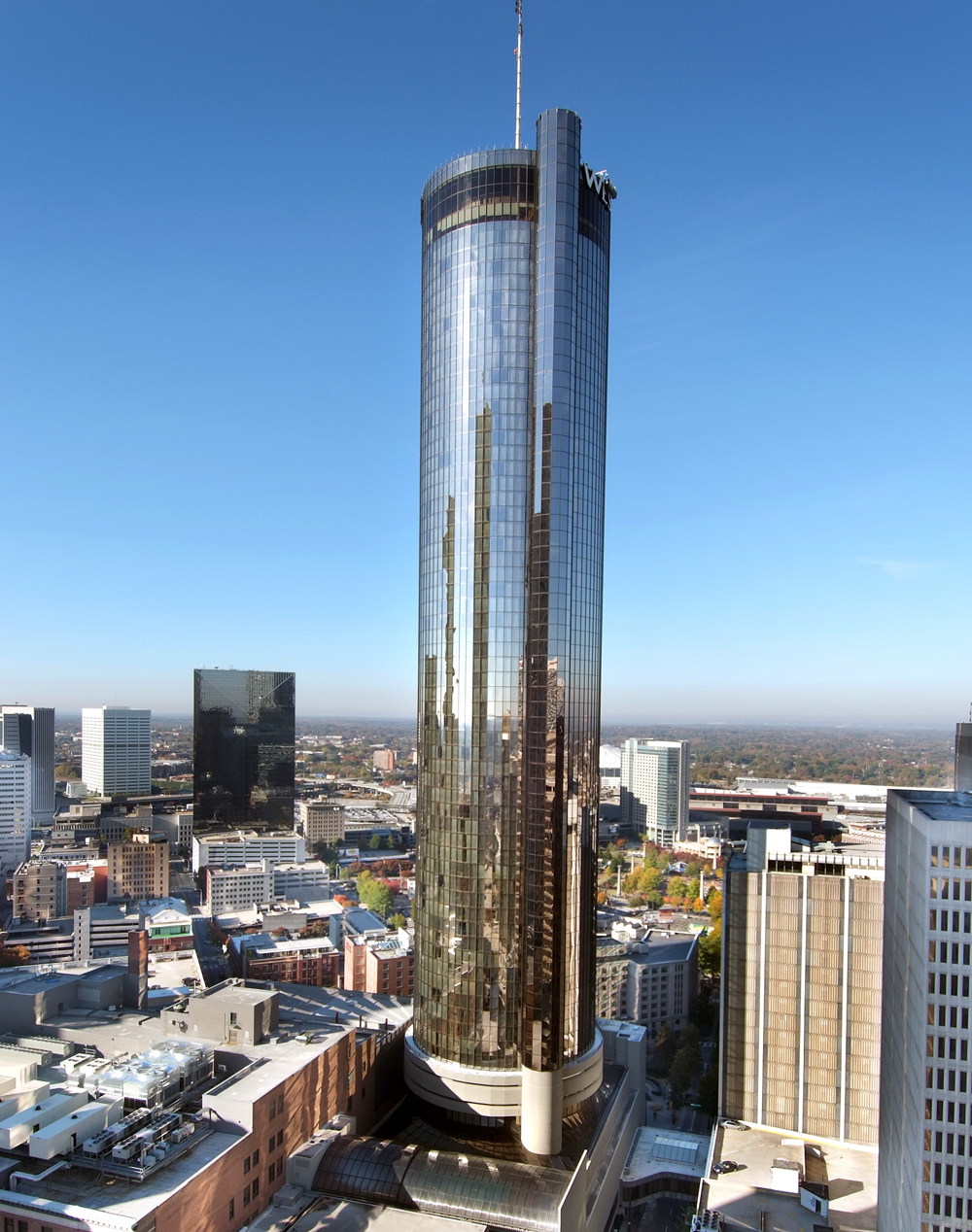 Westin Peachtrree Plaza Hotel in Atlanta, GA on the day of the 1975 topping  out ceremony. The Westin Peachtree Plaza, Atlanta, is a skyscraper hotel on  Peachtree Street in downtown Atlanta, Georgia