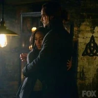 Abbie and Crane hug it out