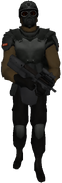 MTF unit standing with his gun lowered.