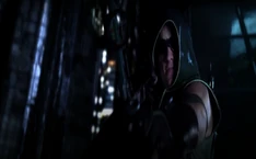 The Green Arrow pointing his sports bow at Siren