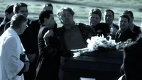 Jonathan in Oliver's funeral.