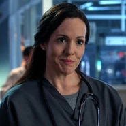Sarah Robson as Amelia Hamilton, a gender-swapped version of the character in Supergirl (2015).