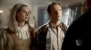 Jor-El meets Hiram and Jessica Kent, the future parents of 