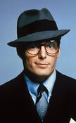 Christopher Reeve as Clark Kent in Superman: The Movie, its sequels (1978, 1980, 1983) and The Flash (2023).