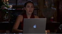 Victoria snooping into Lex's private files.
