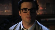 Clark's mild-mannered reporter disguise in Booster