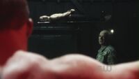 Slade tortures and interrogates Oliver and Arthur
