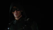 Grant Gustin as alternate reality Oliver Queen/Green Arrow (Barry Allen/The Flash in actual reality) in Elseworlds, Arrowverse crossover event (2018)