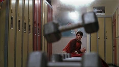 An invisible hand lifting a barbell