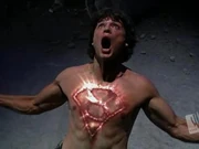 The symbol on Clark's chest begins to disappear.