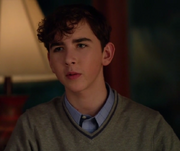 Aidan Fink as a young Lex Luthor on Supergirl