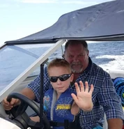 Kelly with his son, who is Logan and Lance's half-brother