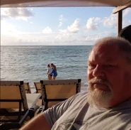 Kelly taking a selfie at the beach