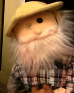 With hat but without his glass eye