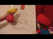 PeachLooksAtCard