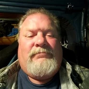 Kelly taking a selfie in his truck