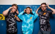 Shayne, Olivia, and Ian in Smosh x SmoshCult Crystal Wash Pizza Hoodies and Tees