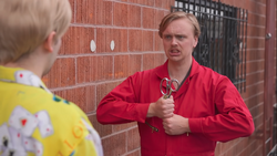 Gus Johnson as a doppelganger from Us.
