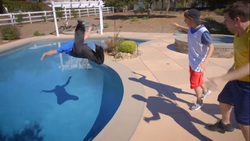 Guy Flawless tossing himself into the pool