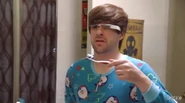Ian wearing Google glasses while brushing his teeth