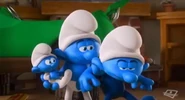 Hefty catching Handy in the episode "Wrench Smurf"