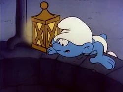What is the secret wish Clumsy is making into the well that he doesn't want any Smurf to know about?